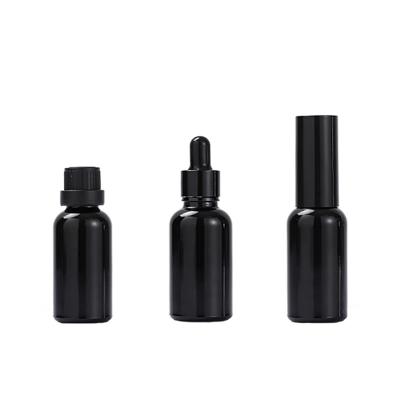 China Cosmetic in stock primary black glass dropper bottle 5-100ml bottle opaque essential oil cosmetic bottle for sale