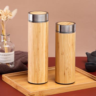 China PORTABLE Creative Double Wall Bamboo Straight Body Heat Insulation Bamboo Stainless Steel Vacuum Flask Shell Stainless Steel Vacuum Tea Bottle for sale