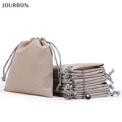 China Luxury Short Plush Jourbon Jewelry Pouch Bag Storage Drawstring Velvet Fabric Pouch For Jewelry Packaging Velvet Bags Custom Jewelry for sale