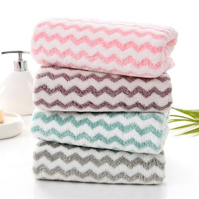 China Factory New Product Direct Household Coral Fleece Child Safe 32 Ply Yarn Water Ripple Multicolor Face Towel for sale