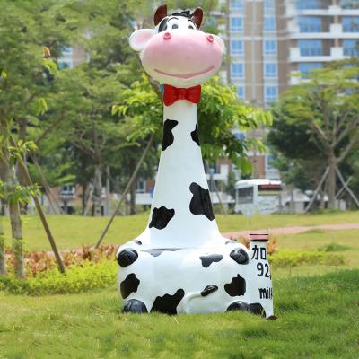 China Worlwide Large Fiberglass Sculpture Art Cartoon Cow Seat Sculptures For Sale for sale