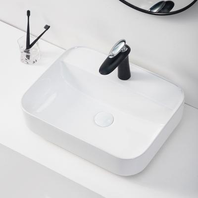 China Simple Modern White Rectangular Worktop Countertop Hand Basin Hole Hand Basin Bathroom Ceramic Sink for sale