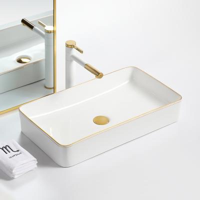 China White Ceramic Bathroom Sink Bathroom Hotel Washroom Table Top Modern Luxury Rectangular Countertop Large Size With Gold Rim for sale