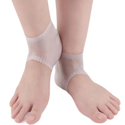 China Women Men Elastic Foot Skin Care Calluses Remove Heel Protector Moisture Split Silicone Heel Sock for sale