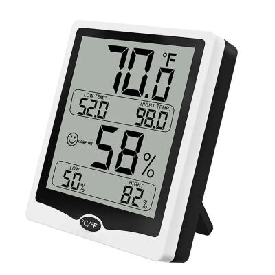 China Household Monitoring Thermohygrometer LCD Screen Digital Thermometer Humidity Nap Clock Weather Station Clock for sale