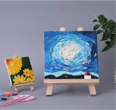 China Amazon Hot Selling Wooden Folding Easel Kids Table Painting Easel with Wooden Panel Set Wooden Display Easels Stand for sale