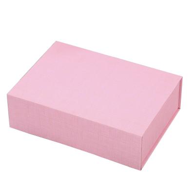 China Handmade Custom Magnetic Paper Flap Foldable Cardboard Decorative White Newborn Baby Clothing Sets Tissue Packing Box For Jeans Dresses for sale