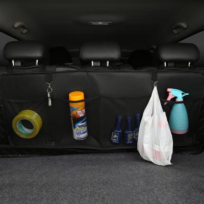 China Foldable Customizable SUV 4 Pockets Hanging Rear Seat Storage Organizer Car Trunk Storage Bag Folding Boot for sale