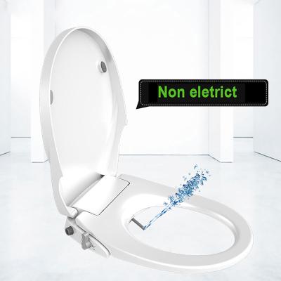 China Modern Easy Installation Non Electric Dual Nozzle Cold Water Soft Close Round Shape Toilet Seat Cover With Bidet Integrated Function for sale