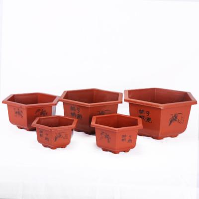 China Minimalist Durable Home Garden Supplies Multiple Sizes Planter Transplant Plastic Nursery Hexagonal Flowerpot for sale