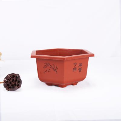 China Minimalist Wholesale High Quality Cheap Medium Sized Plastic Decorative Flower Pots Planters for sale