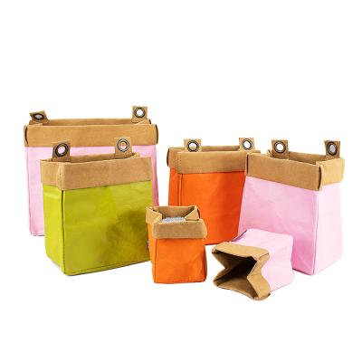 China Sustainable Portable Cute Hanging Cosmetic Organizer Reusable Travel Kraft Paper Storage Bags for sale