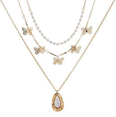 China Bohemia Bohemia Butterfly and Pearl Tassel Charm Three Layered Necklace Jewelry Sets for sale