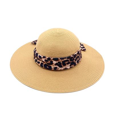 China Custom Ribbon Beige Color Wide Brim Straw Beach Hat With Leopard Print Bow Decoration for sale