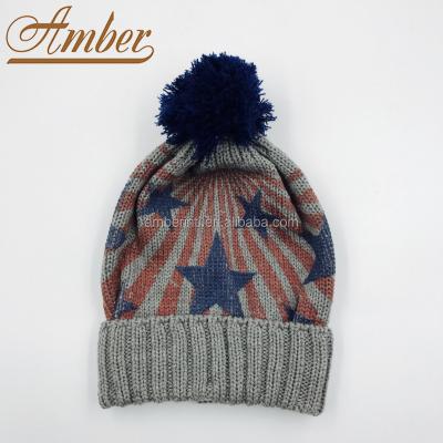 China Custom Stripes Stars Printing Children's Winter Knitted Beanie Hat with Pompom for sale