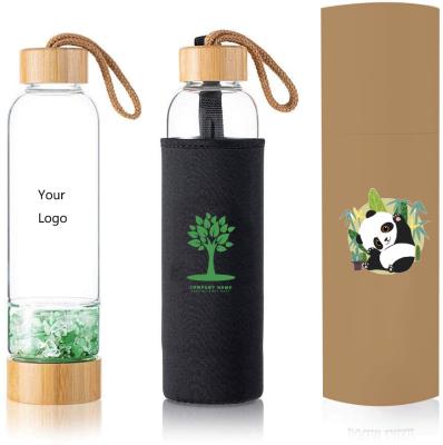 China Minimalist Borosilicate Glass Gemstone Crystal Water Bottle With Bamboo Lid for sale