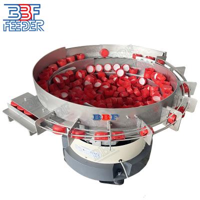 China Conveyor System Cap Bowl Feeder Crown Lids Flip Top Cap Vibrating Linear Feeder for sale