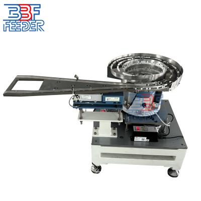 China Dual Channel Vibratory Bowl Feeder Bottle Crown Lid Vibrating Cap Feeder Te koop