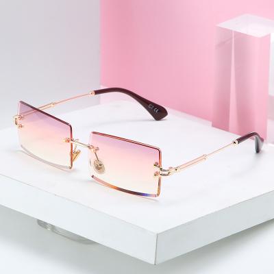 China 2021 Hot Fashion Vintage Eyewear Retro Sunglasses Men Women Tinted Small Rectangle Rimless Sunglasses for sale