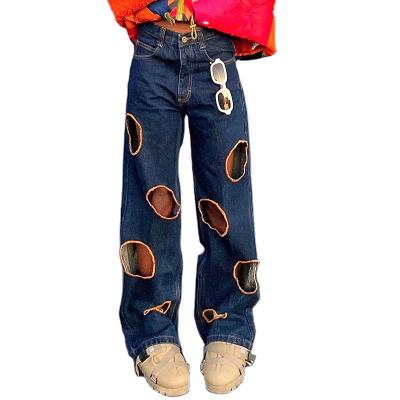 China Breathable Casual Jeans Pants Holes Mid Rise Loose Denim Hollow Out Straight Leg Ripped Pants For Women for sale