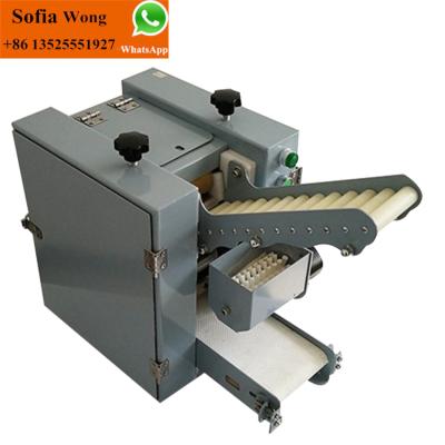 China Low Energy High Speed ​​Spring Roll Wrapping Skin Making Machine Price for sale