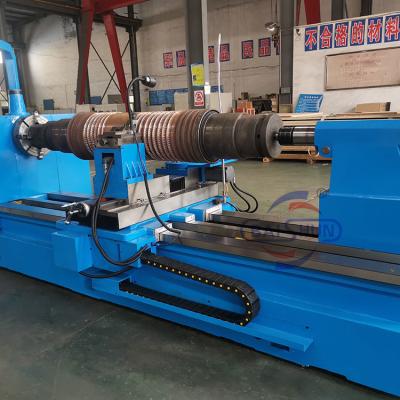 China Steel Roller Cnc Roller Turning And Notching Machine Ribble Making Machine for sale