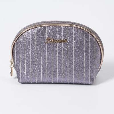 China Luxury Custom Luxury Luxury Logo Dinner Travel Durable Bling Bling Golden Glitter Makeup Cosmetic Bags for sale