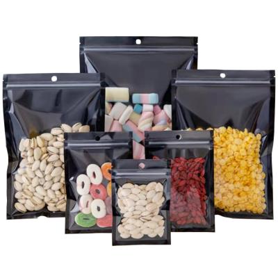 China Recyclable Black Resealable Food Package Flat Jewelry Lock Zipper Pouches With Hang Hole Zipper Clear Front Mylar Plastic Bag for sale