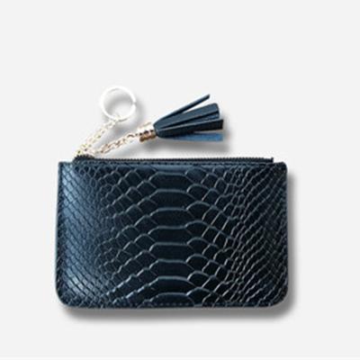 China Fashion Women's Leather Small Short Wallet Simple Zipper Coin Purse Fashion Crocodile Pattern Coin Bag for sale