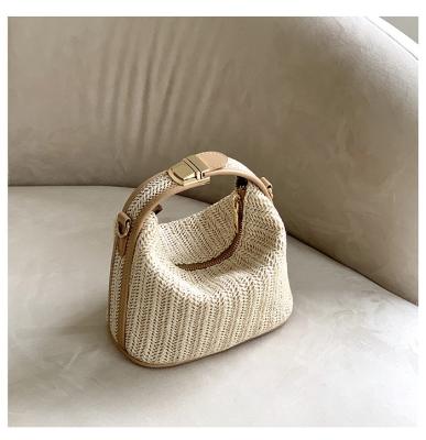 China Prepared by Bohemian Woven Luxury Purses and Korean Straw Handbags Women's Summer Small Messenger Beach Bags for sale