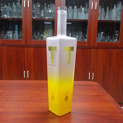 China Beverage Cork Top 700ML Vodka Yellow Liquor Bottle Frosted Print Vodka Bottle for sale