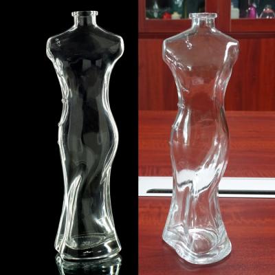 China Empty Beverage Weight Glass Bottle 350 Body Shaped Wine Bottle for sale