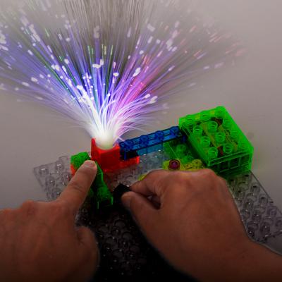 China DIY Building Block Educational Colorful Fiber Optic Electric Power Tree Building Blocks Science Experiment DIY Toys With Light Bulb Alarm for sale