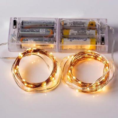 China Decoration 2 5M Indoor Modes Festival Warm White 3AA Battery Box 100 LED Silver Wire Twinkle Micro String Lights for sale