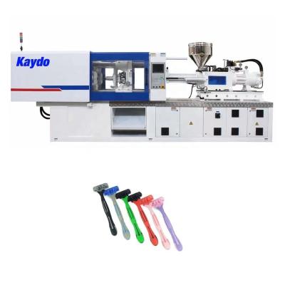 China Kaydo china suppliers new product horizontal razor head with handle injection molding machine desktop equipment for sale