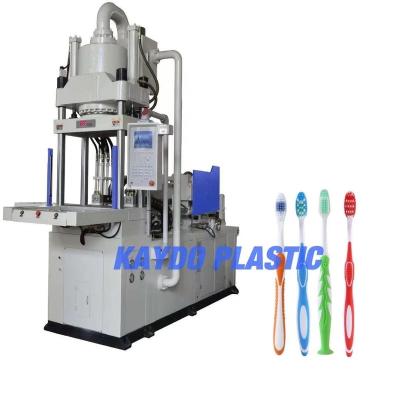 China VERTICAL Two Color Toothbrush Injection Molding Machine In Vertical Type Plastic Machine for sale