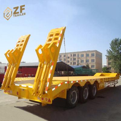 China Truck Trailer 3 Axles 100 Ton Lowbed Lowboy Semi Trailer With Hydraulic Ramp for sale