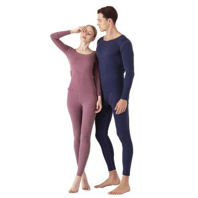 China QUICK DRY Winter Polyester Material Breathable Men Thermal Underwear Women Thermal Underwear Set for sale