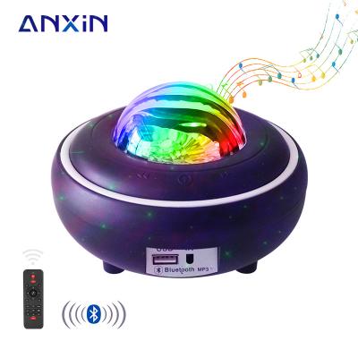 China Post-modern Package Rotation LED Star Projector Wave Night Light Music Player Integrated Star Projector for sale