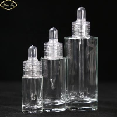 China Clear Personal Care 100ml Cylinder Perfume Glass Bottle Perfume With Glass Dropper For Hair Oil Used for sale