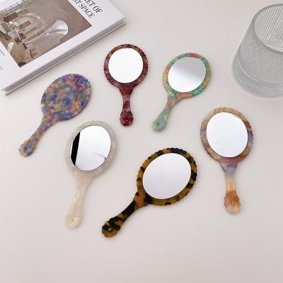 China 2022 Korean Retro Fashion Acetate Mirror 12.4cm Mirror Handle Environmental Friendly Oval Makeup Mirror For Women for sale