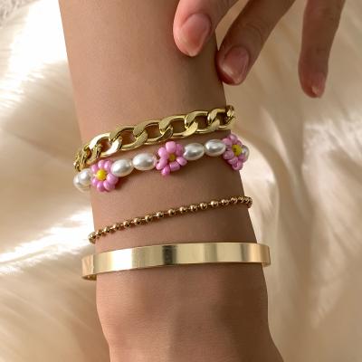 China 2021 New Environmentally Friendly Fashionable Handmade Flower Seed Beads And Link Chain Bracelets Layered Bracelets Set For Women for sale