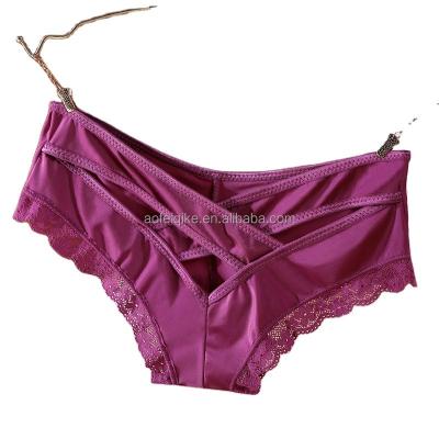 China European and American sexy women breathable panties ice silk seamless briefs cross hollow panties for sale