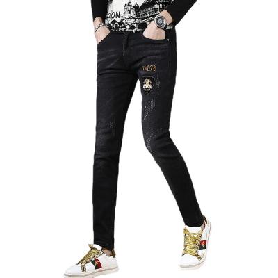 China 2021 autumn/winter fashion new embroidered jeans men's slim feet handsome black stylish men's long pants viable for sale