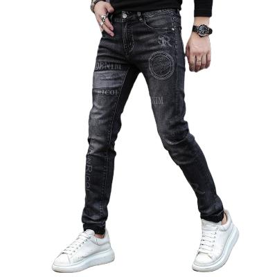 China Autumn new men's jeans Korean thin embroidery breathable spring black elastic pants brand men wholesale for sale