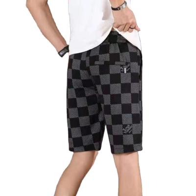 China Anti-Wrinkle Embroidered Men Five-Tinny Pants Wear Fashion Ice Casual Pants Silk Sports Shorts Mens Summer Loose Pants for sale