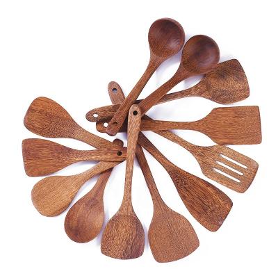 China Durable High Grade Solid Wood Cookware Comfortable To Hold Wooden Cookware Smooth Outdoor Wooden Chicken Wings Spoon for sale