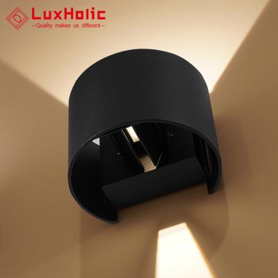 China Wall Decoration IP65 LED Corridor Beam Angle Modern LuxHolic Adjustable Upper And Lower Outdoor Waterproof Light for sale