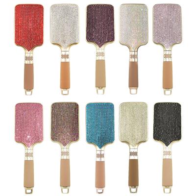 China Bling bling shiny faux stone shimmering comb sweep wide plastic brushes wooden handle girls personality hair care production for sale