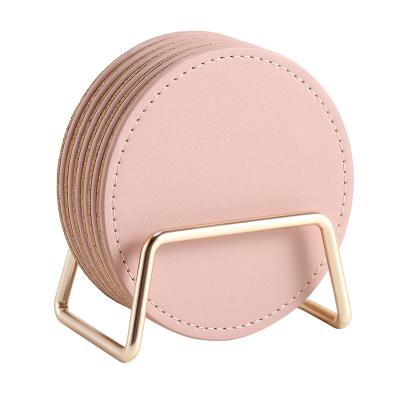 China Viable Custom Logo Round PU Leather Car Coasters Set With Gold Metal Holders Desktop Decoration Six Drink Cork Coasters With Tea Stand for sale